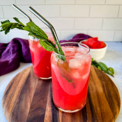 watermelon water in a glass with fresh mint and ice cubes