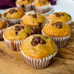 banana protein muffin with chocolate chips on a flat surface