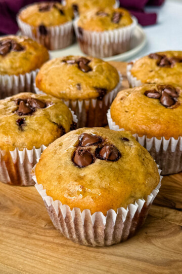 banana protein muffin with chocolate chips on a flat surface