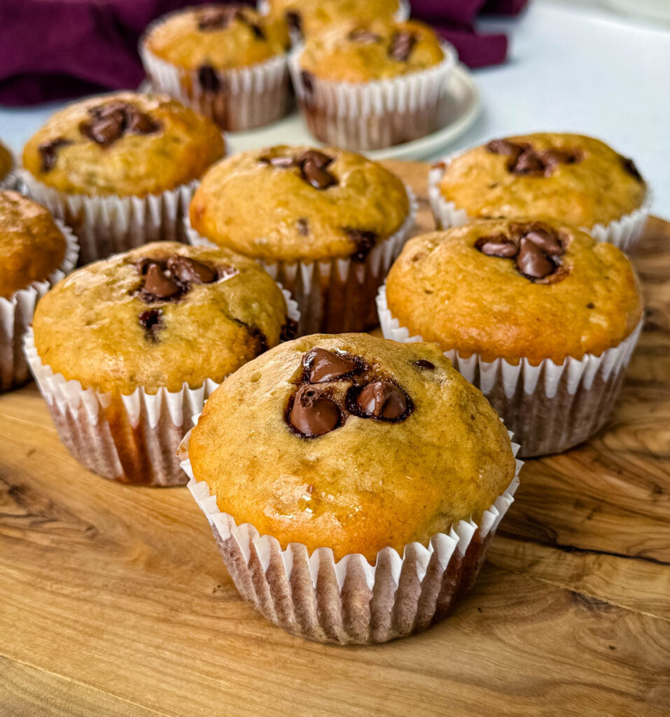 banana protein muffin with chocolate chips on a flat surface