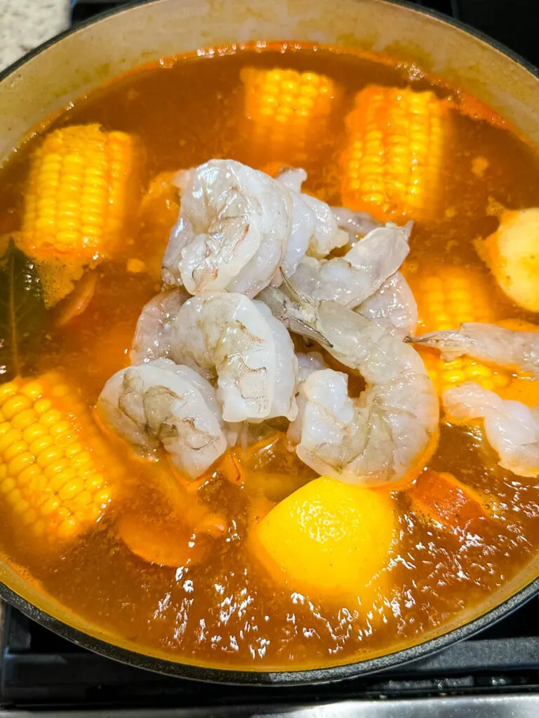 shrimp boil and vegetables in a Dutch oven