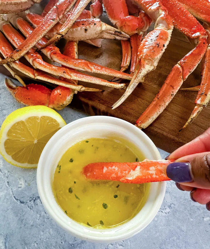 snow crab leg meat dipped in melted butter