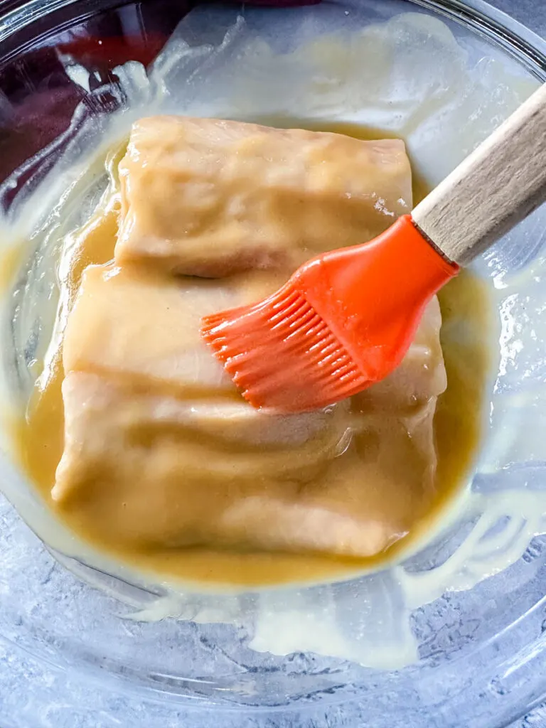 black cod marinated with miso sauce in a glass pan