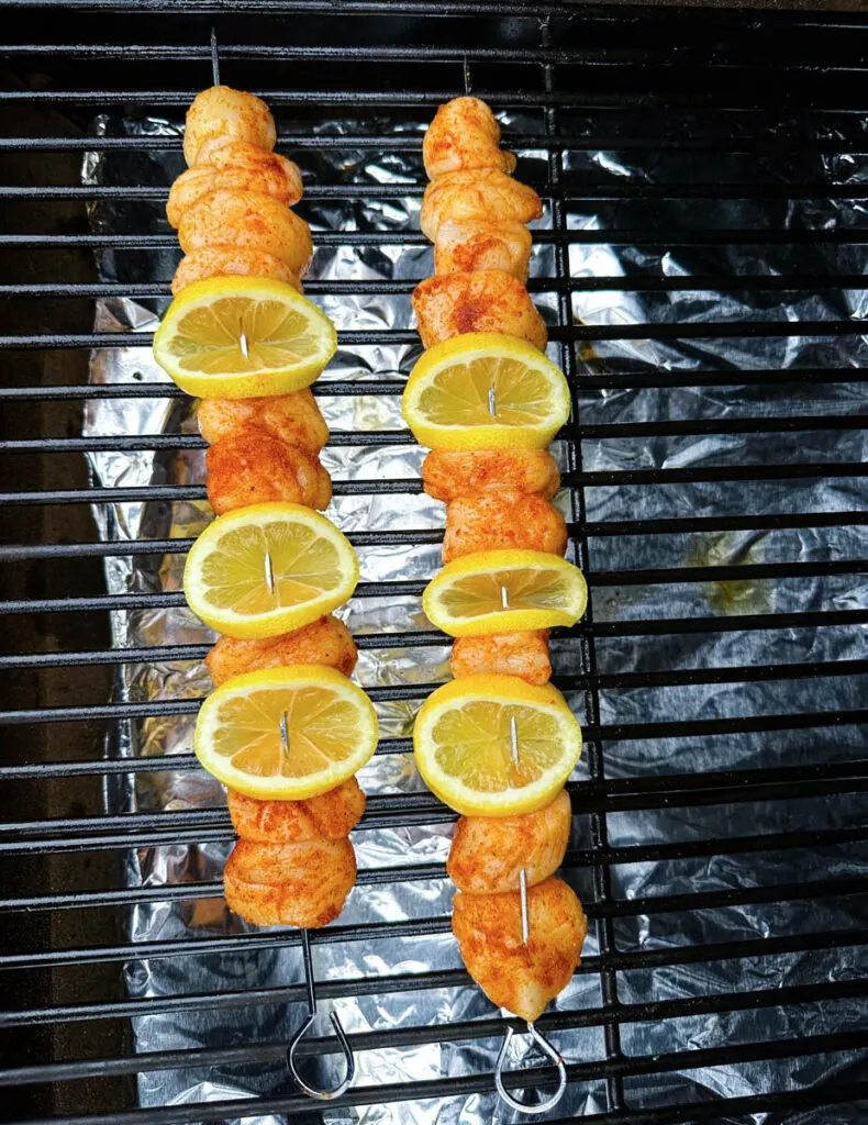 scallops and lemons on a skewer on a Traeger grill