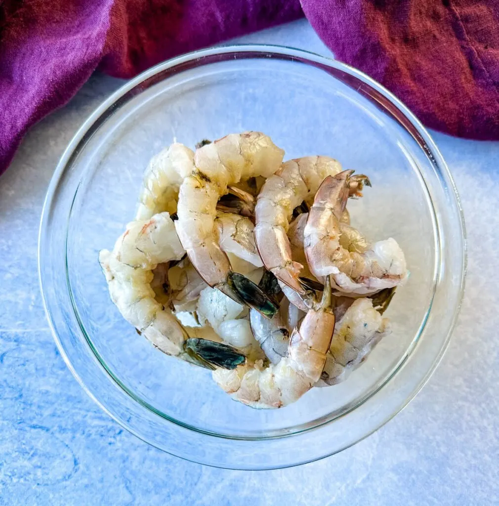 raw shrimp in a glass bowl