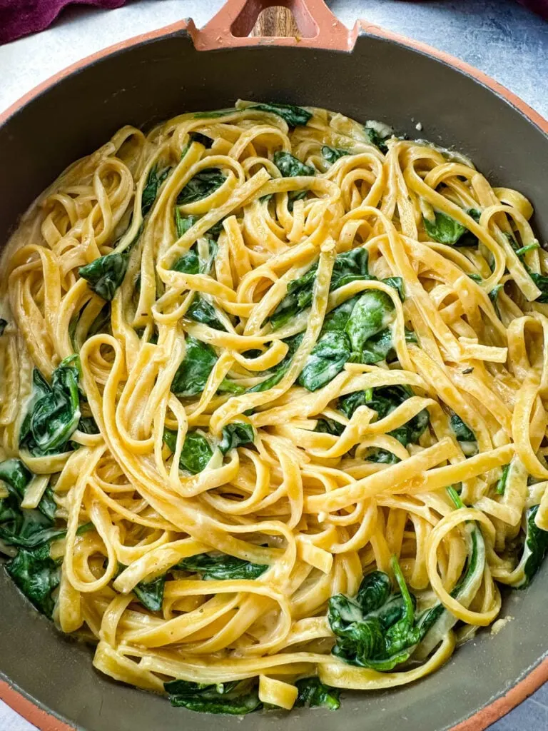 cooked Fettuccine Alfredo in a pan