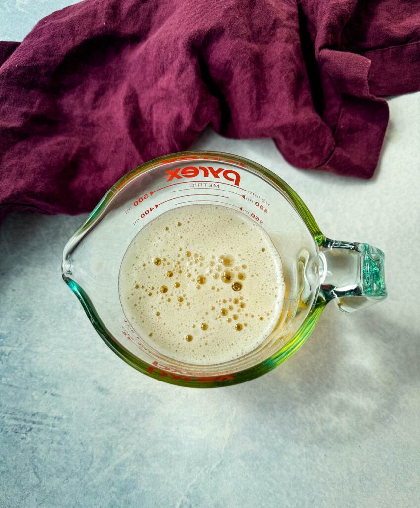 beer in a glass measuring cup