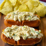 crab seafooxd rolls on buns with chips