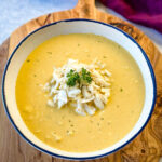 crab bisque in a white bowl with lump crab meat and flour