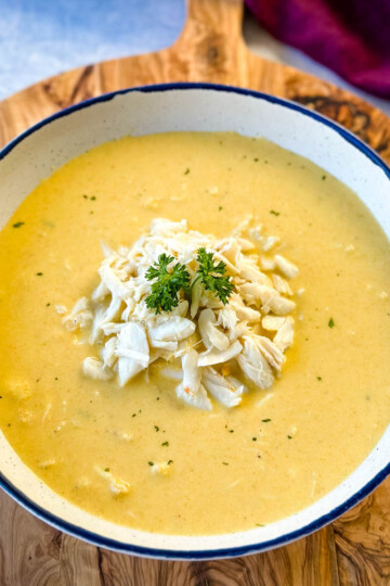 crab bisque in a white bowl with lump crab meat and flour