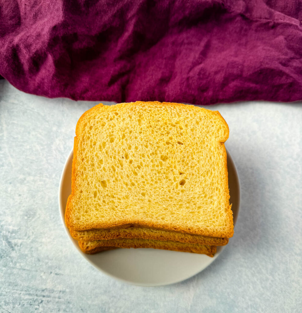 sliced brioche bread on a plate