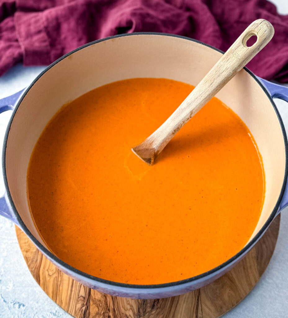 creamy tomato soup in a Dutch oven