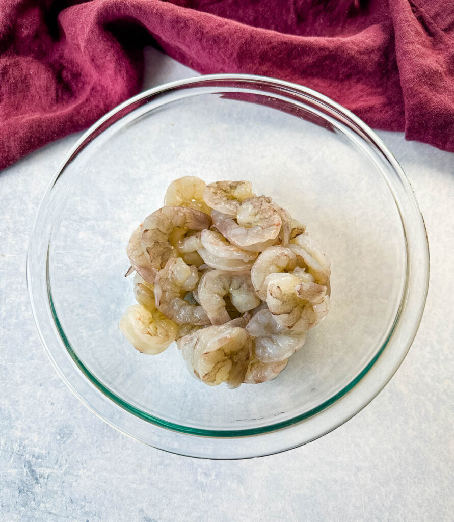 raw shrimp in a glass bowl