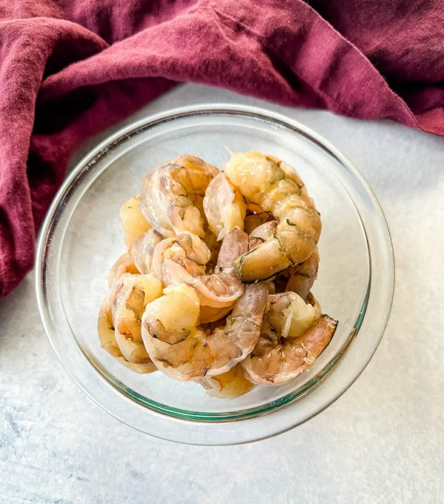 raw shrimp in a glass bowl