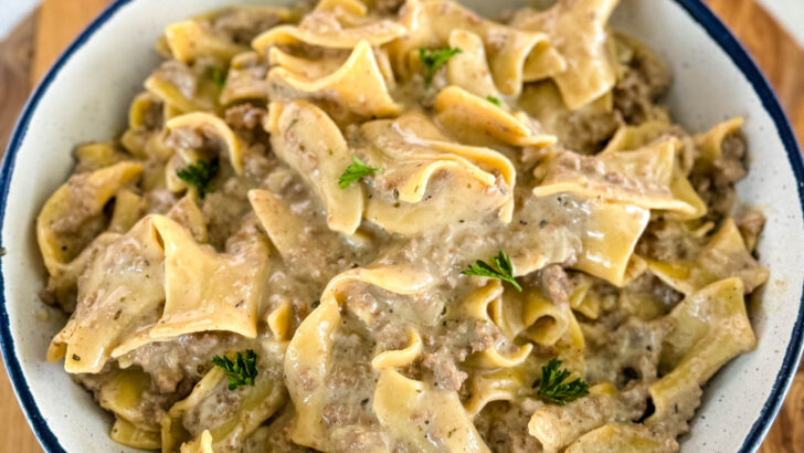 beef and noodles in a white bowl