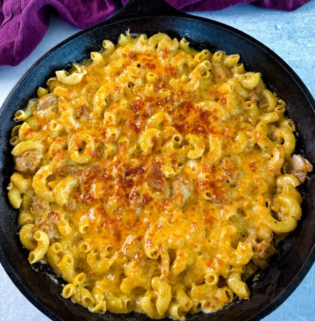 chicken mac and cheese in a cast iron skillet