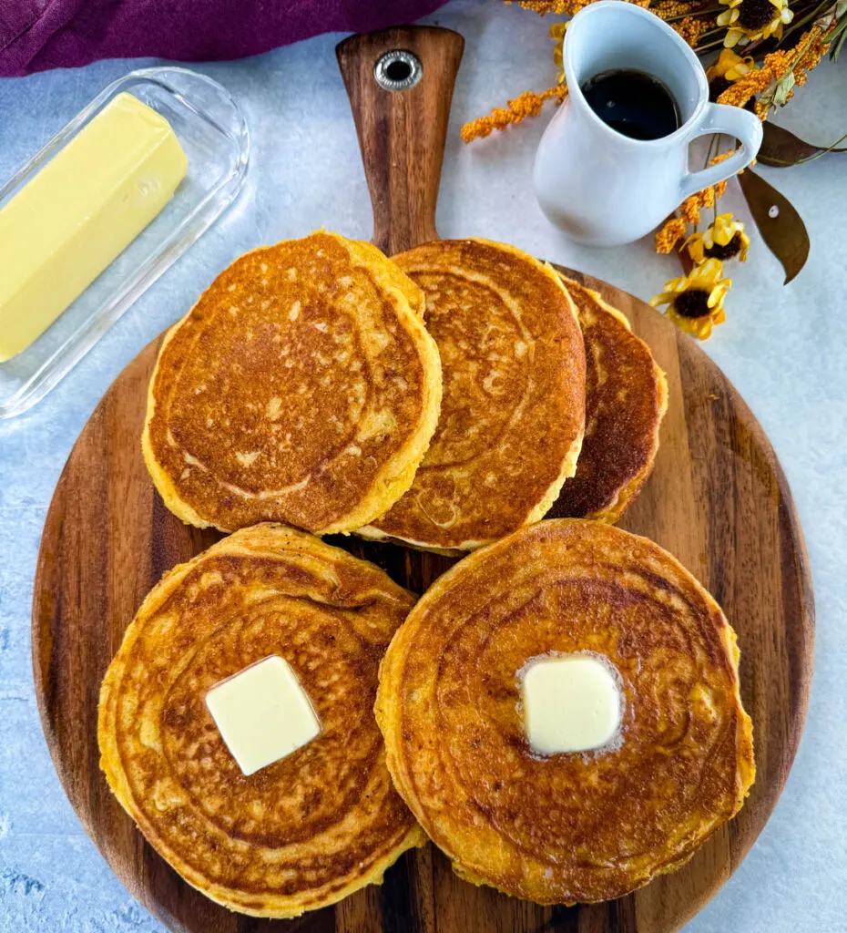 fried cornbread with butter on a plate