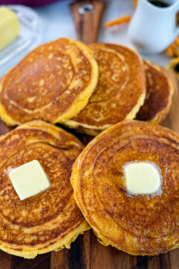 fried cornbread with butter on a plate