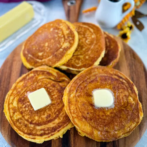 fried cornbread with butter on a plate