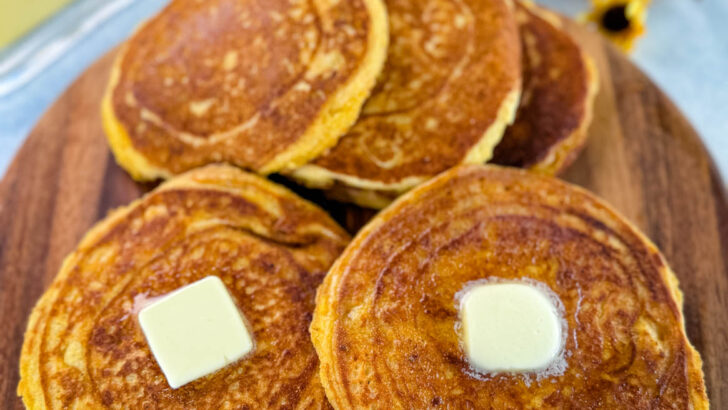 fried cornbread with butter on a plate