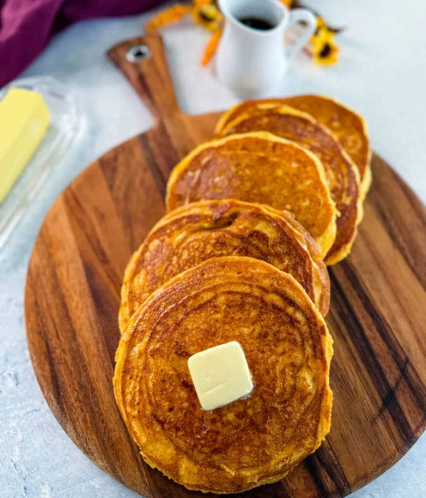 fried cornbread with butter on a plate