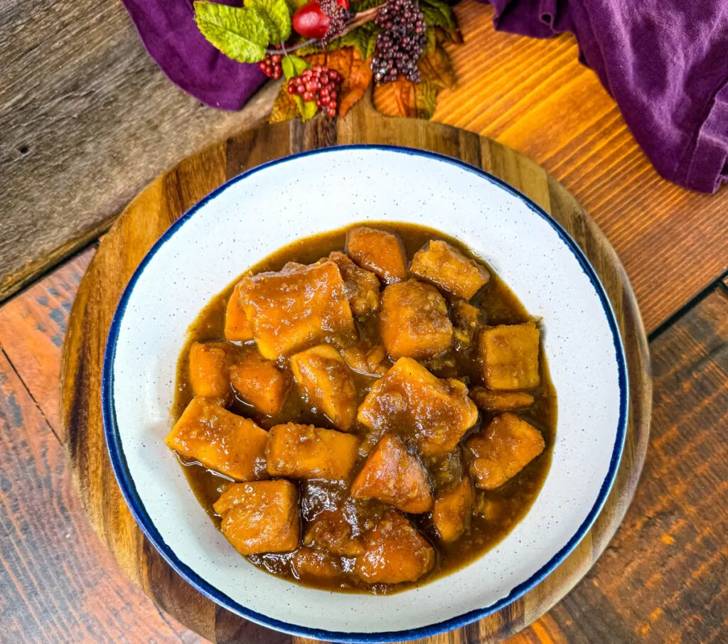 canned candied sweet potatoes in a white bowl