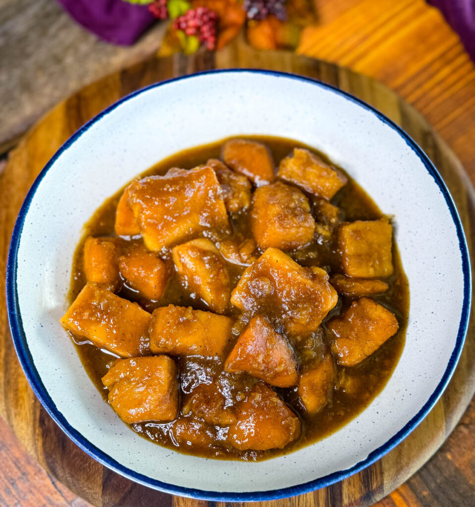 canned candied sweet potatoes in a white bowl