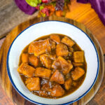 canned candied sweet potatoes in a white bowl