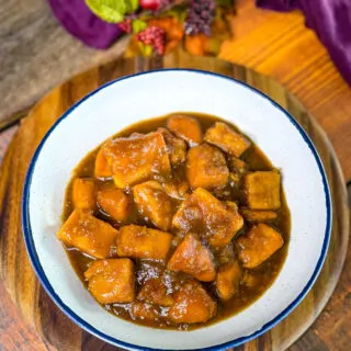 canned candied sweet potatoes in a white bowl