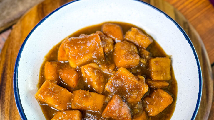 canned candied sweet potatoes in a white bowl