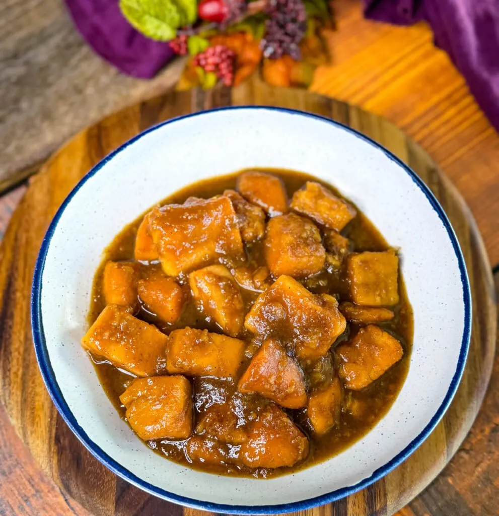 canned candied sweet potatoes in a white bowl