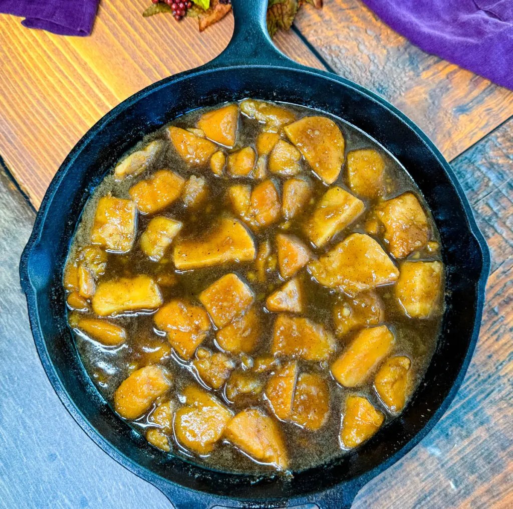 canned candied sweet potatoes in a cast iron skillet