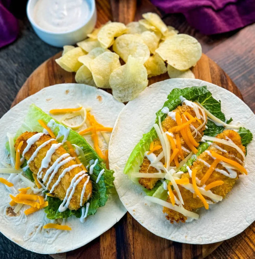 chicken snack wrap on a tortilla with ranch dressing and shredded cheese