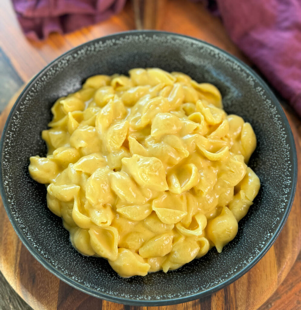 stovetop mac and cheese in a black bowl