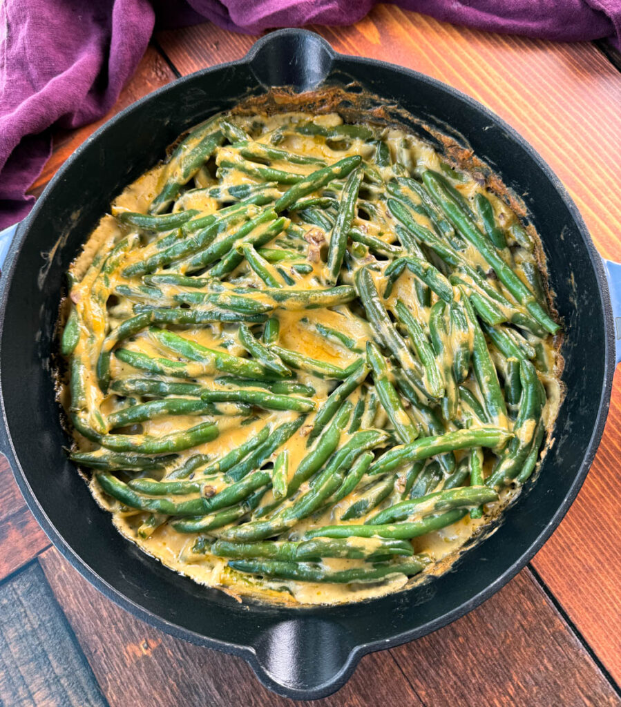 unbaked green bean casserole without canned cream of mushroom soup in a skillet