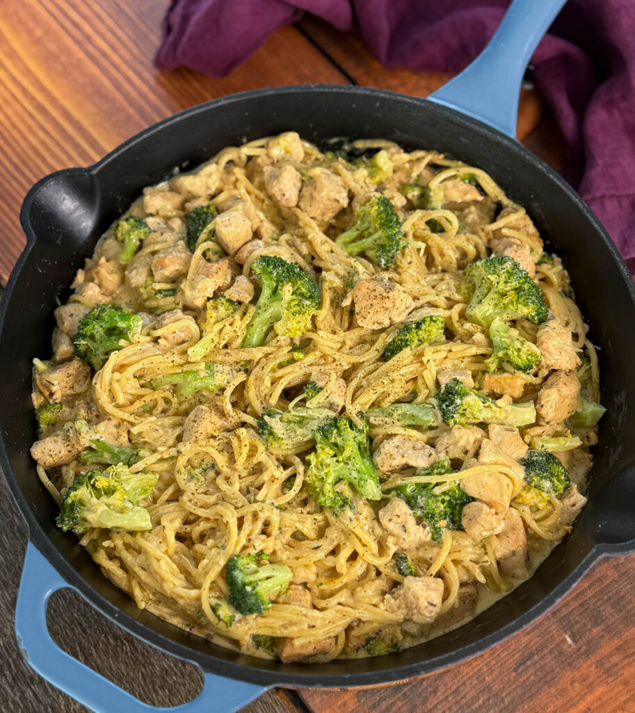 creamy chicken broccoli Alfredo in a skillet