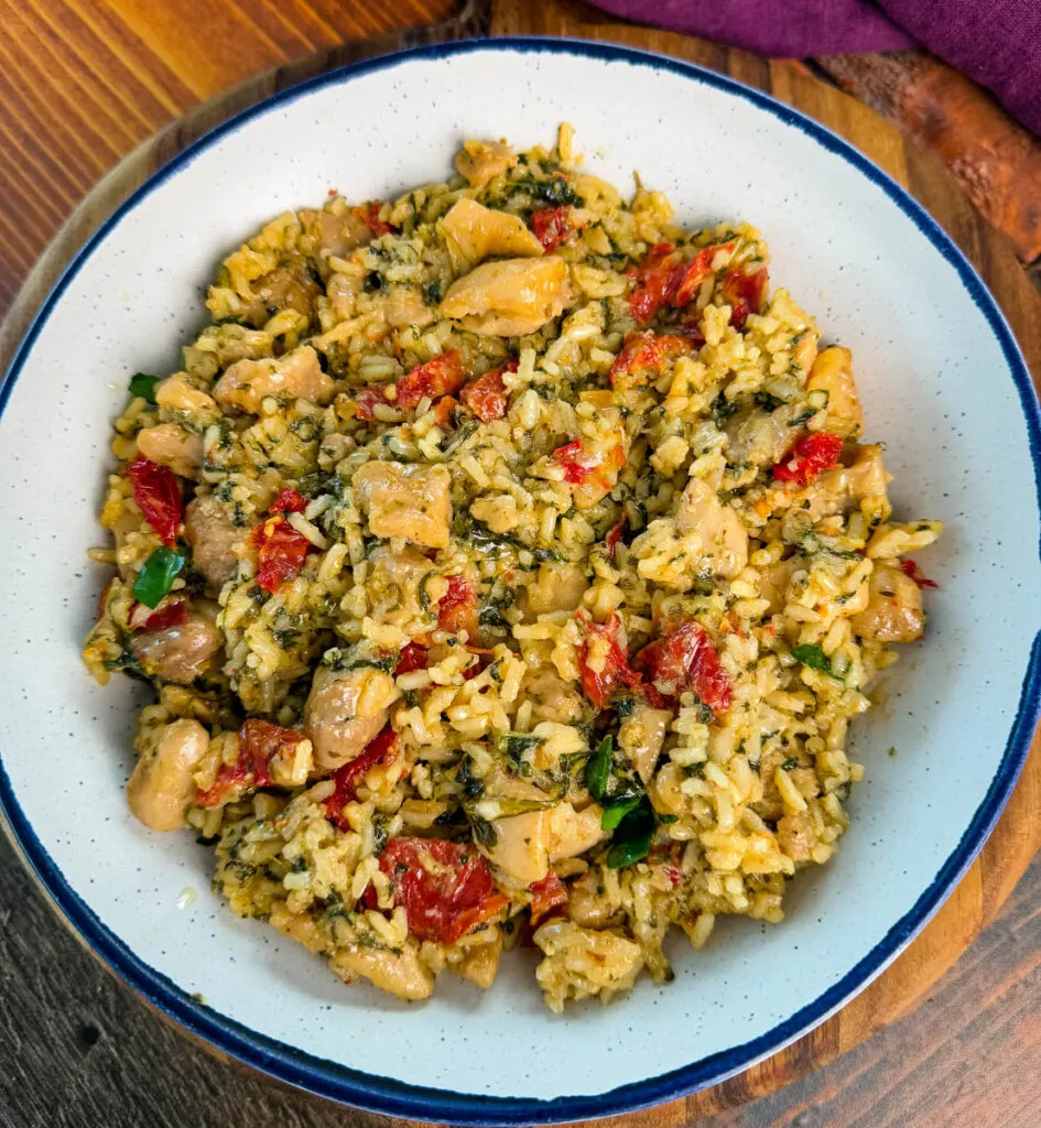 marry me chicken and rice in a white bowl