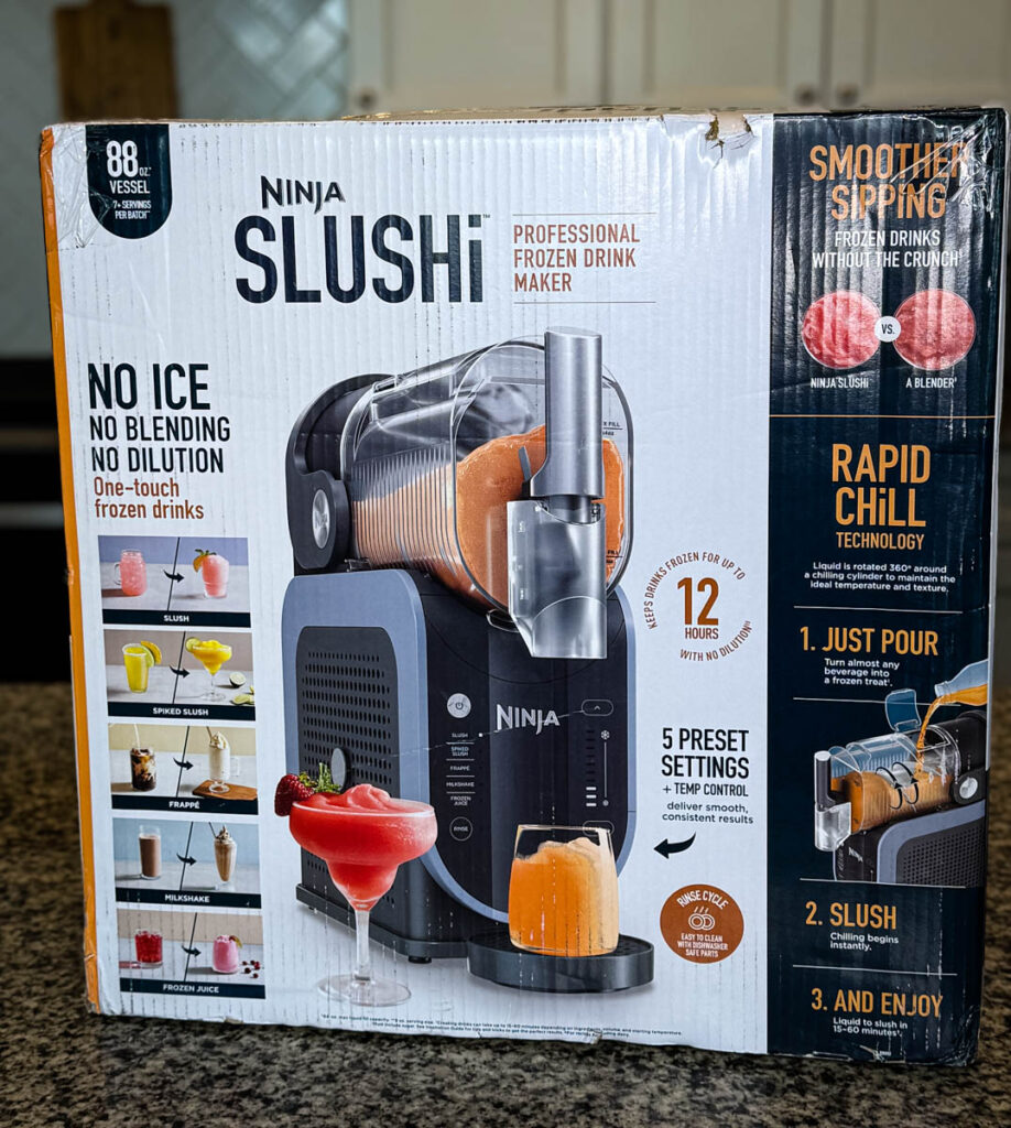 Retail Packaging of the Ninja SLUSHi Machine – The product box highlights key features such as "No Ice, No Blending, No Dilution", 5 preset settings, and Rapid Chill Technology.