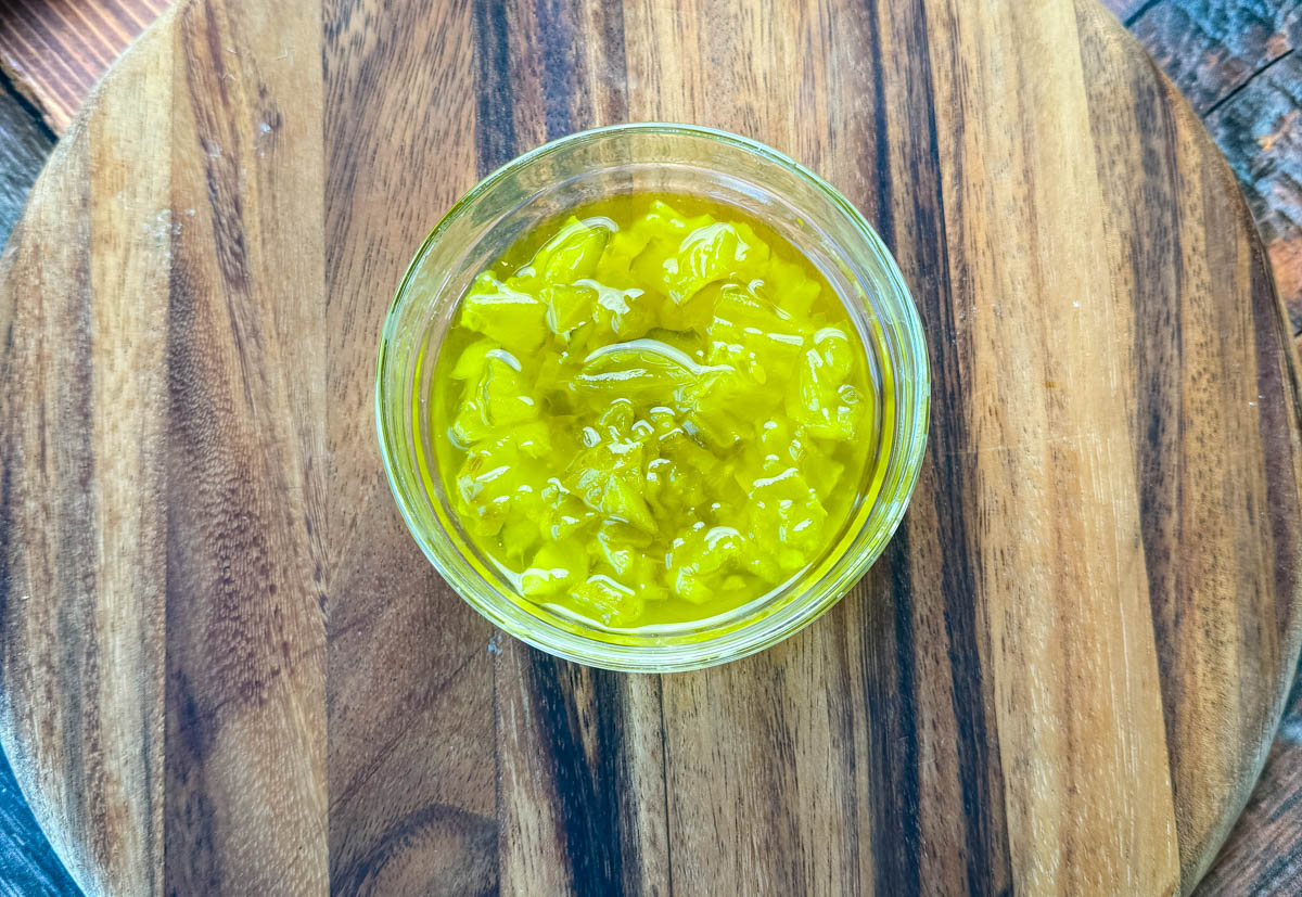 diced pickles in a glass bowl